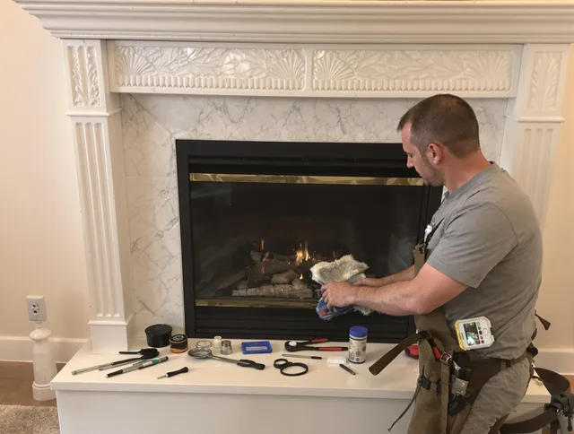 Town 'n' Country Chimney Sweep performing fireplace maintenance in Town 'n' Country, FL